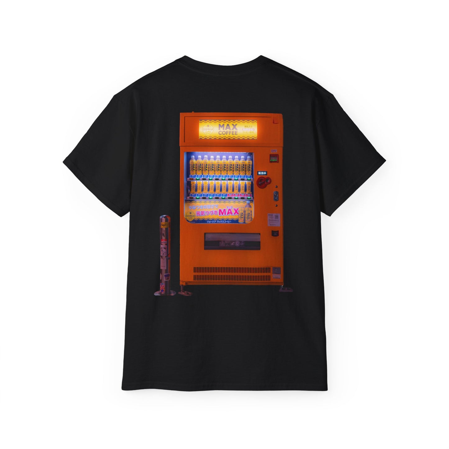A black t-shirt featuring a graphic print of a vintage coffe vending machine.