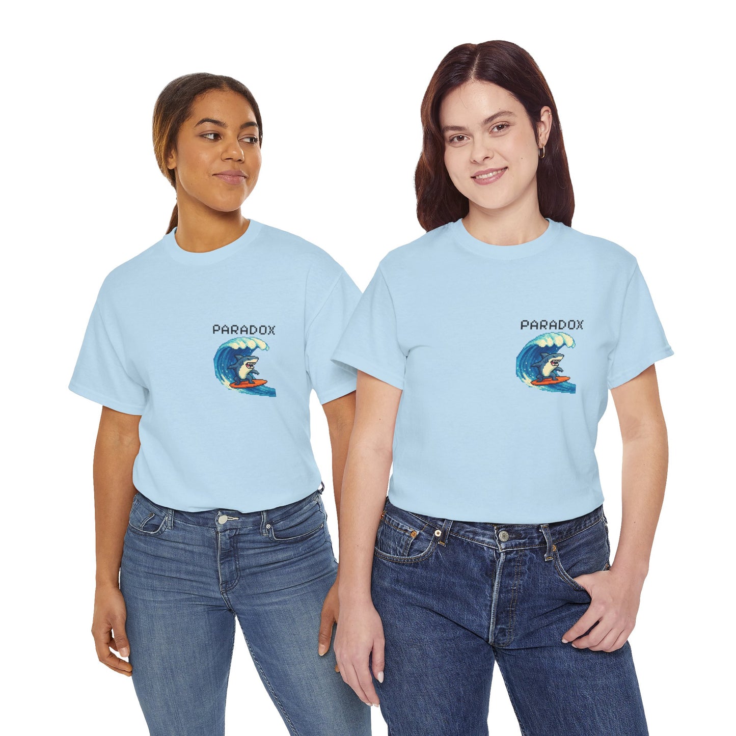 Blue t-shirt with a graphic pixel art of a shark surfing on two female models