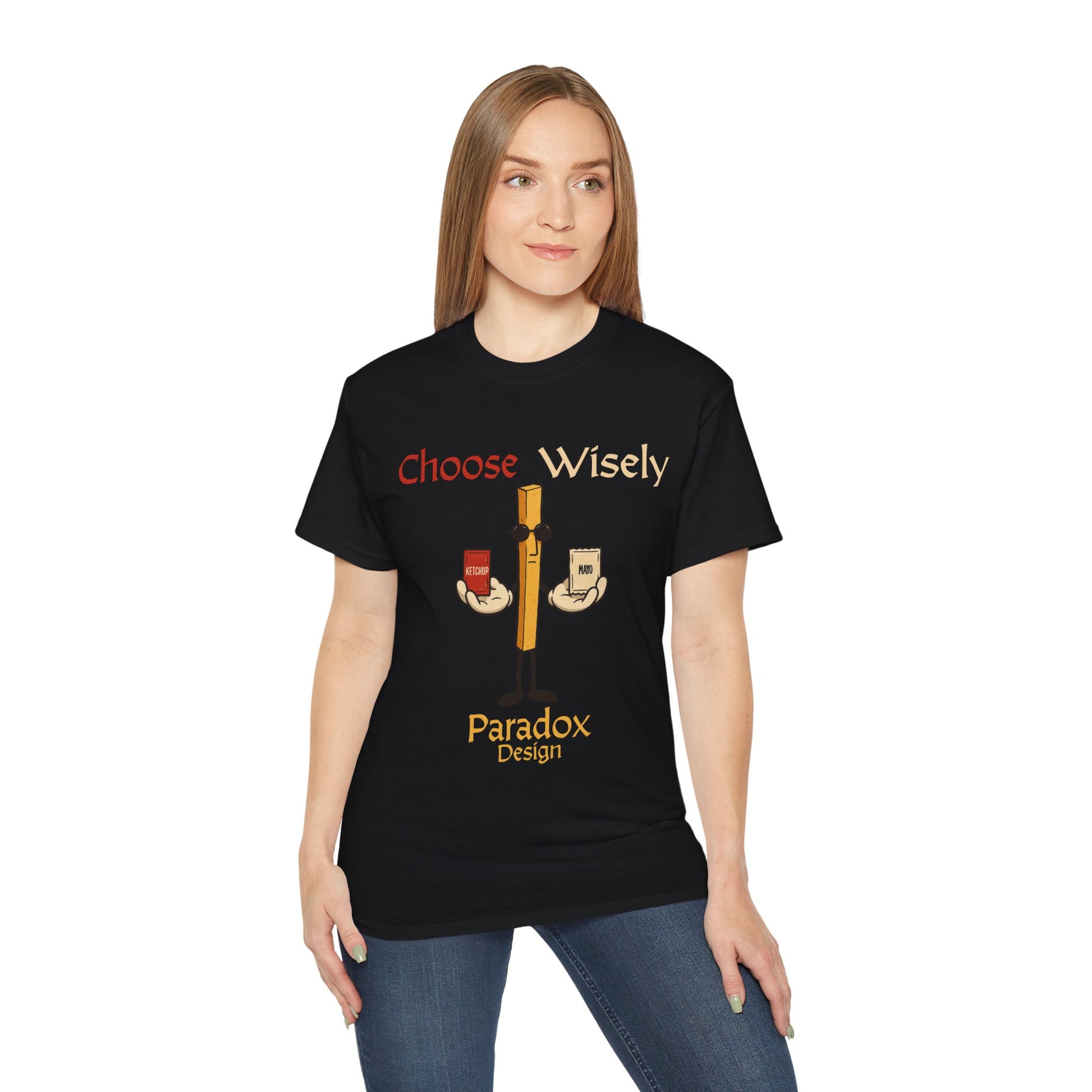 Black t-shirt of fries character holding a pack of ketchup and mayo for the funny debate of which sauce to chose for fries on a female model.