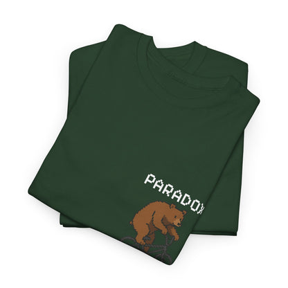 Green t-shirt with a graphic pixel art of a bear on a bmx close up