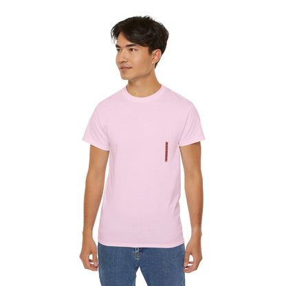 A pink t-shirt with a graphic print of a dragon and Samurai design elements based on real art male model.