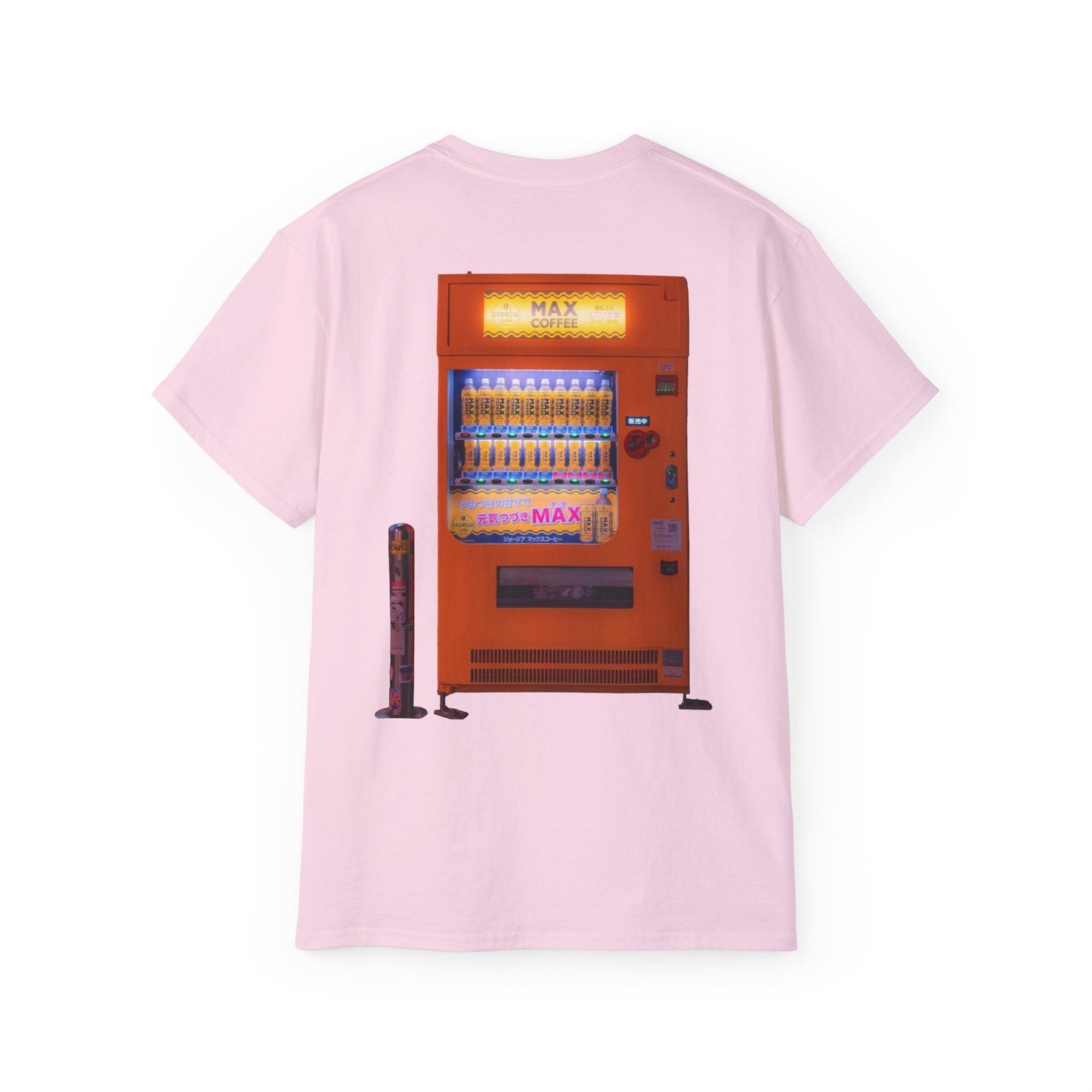 A pink-colored t-shirt featuring a graphic print of a vintage coffe vending machine.