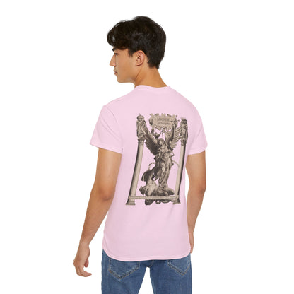 A pink t-shirt featuring a graphic print of Saint Michael in in sculpture form in victory on a male model.