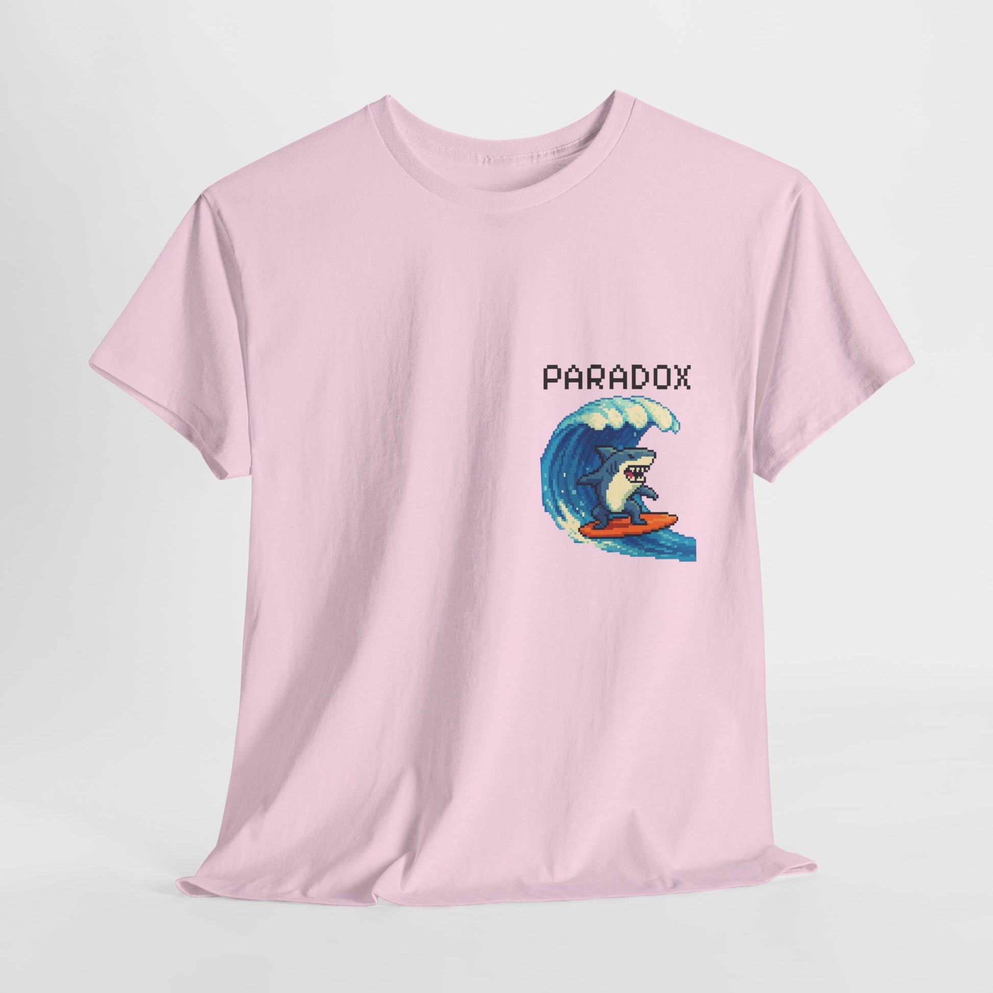 Pink t-shirt with a graphic pixel art of a shark surfing