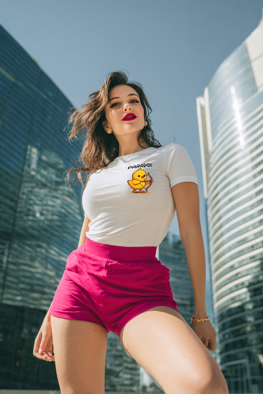 White t-shirt with a graphic pixel art of a baby chick with a bow and arrow on a female model