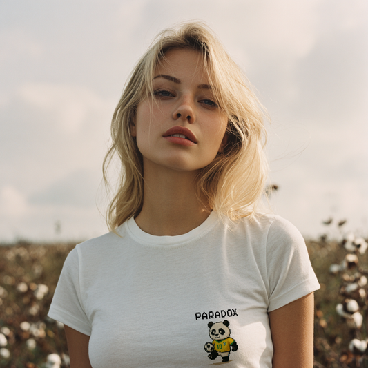 White t-shirt of a graphic pixel art panda playing soccer on a female model
