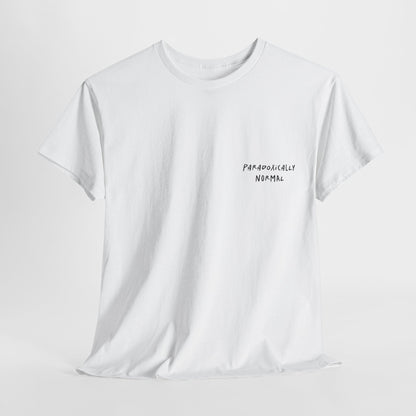 White t-shirt with a graphic of a text reading 'Paradoxically Normal' 