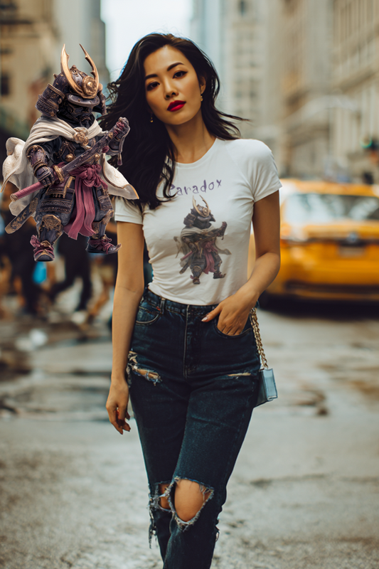 Woman walking on a city street wearing a white graphic t-shirt of a ninja and ripped jeans.